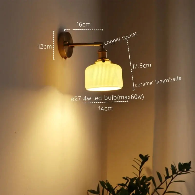 Vintage brass ceramic led wall sconce with warm-toned ribbed ceramic lampshade mounted on copper finish decorbites ceramic led wall