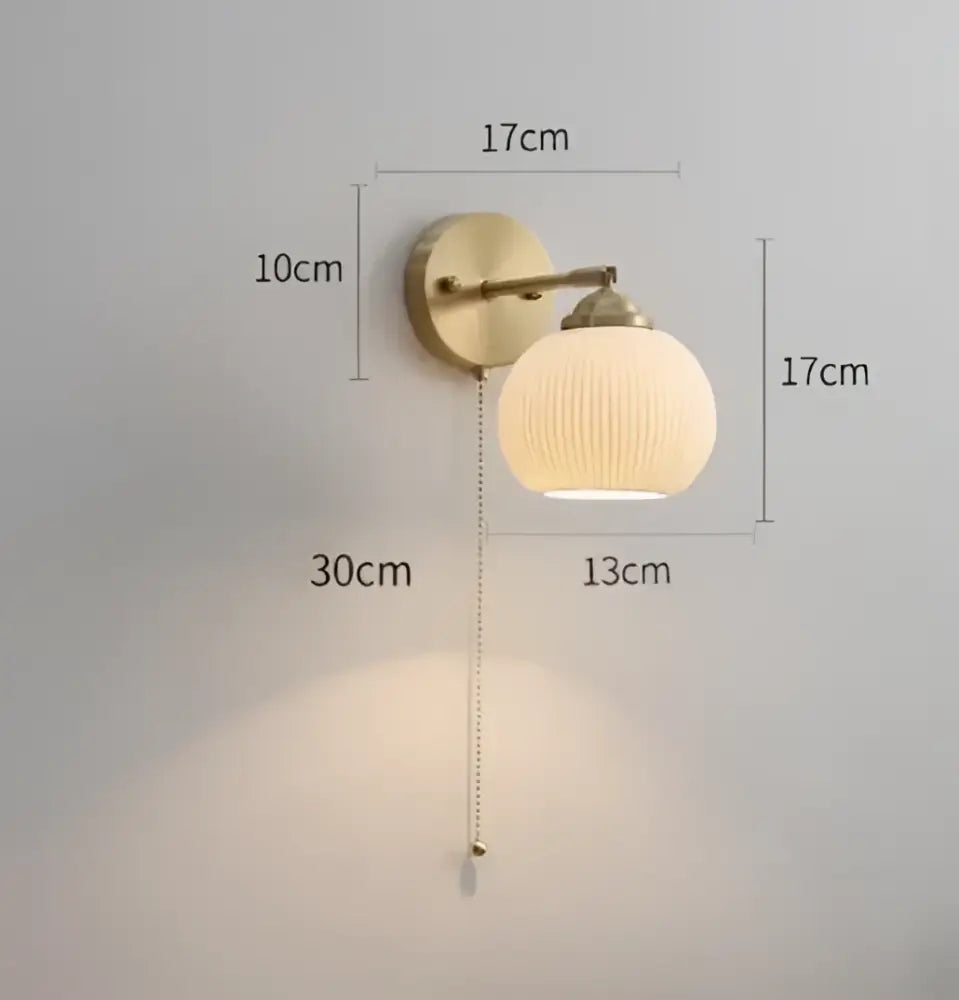Vintage brass ceramic wall lamp with knob switch and ribbed off-white glass shade for bedroom decorbites ceramic wall sconce