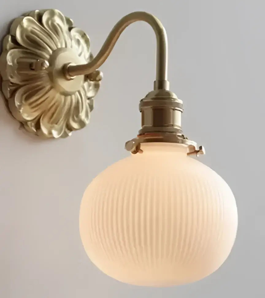 Antique brass ceramic wall lamp with ribbed frosted glass shade for bedroom decor by decorbites wall lamp