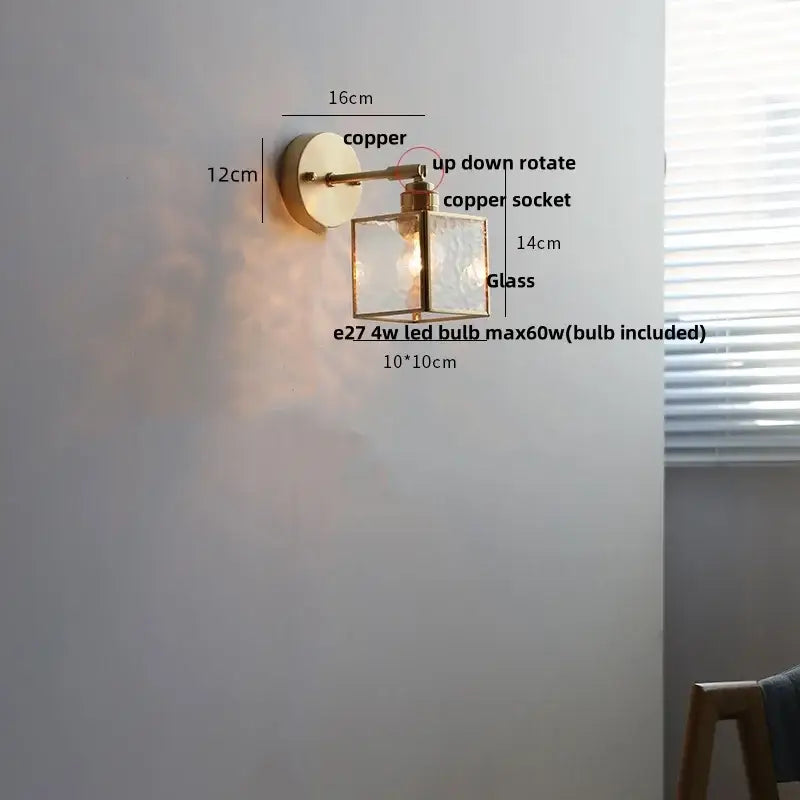 Copper-finished vintage brass wall lamp with clear glass square shade and pull chain switch featuring adjustable rotation