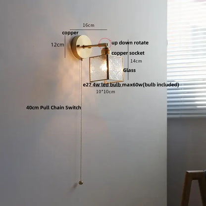 Copper-finished wall lamp with clear etched glass shade and 40cm pull chain switch for bathroom use