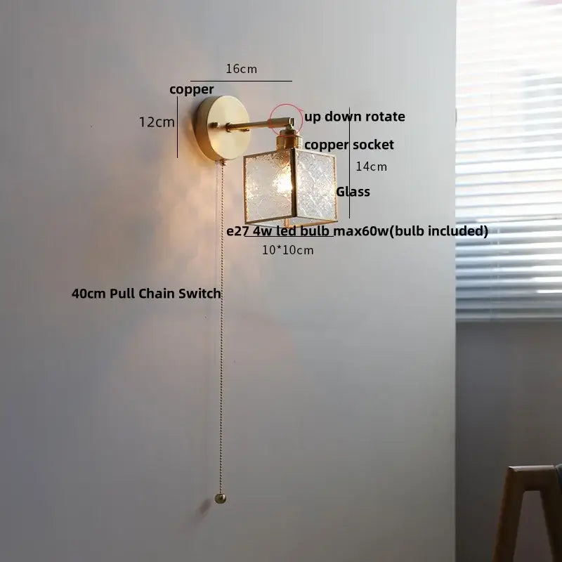 Copper-finished wall lamp with clear etched glass shade and 40cm pull chain switch for bathroom use