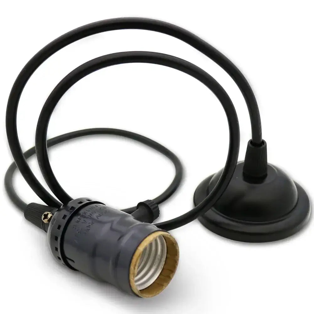 Black plastic lamp socket with coiled cord and base for vintage brass and copper aluminum pendant light decorbites