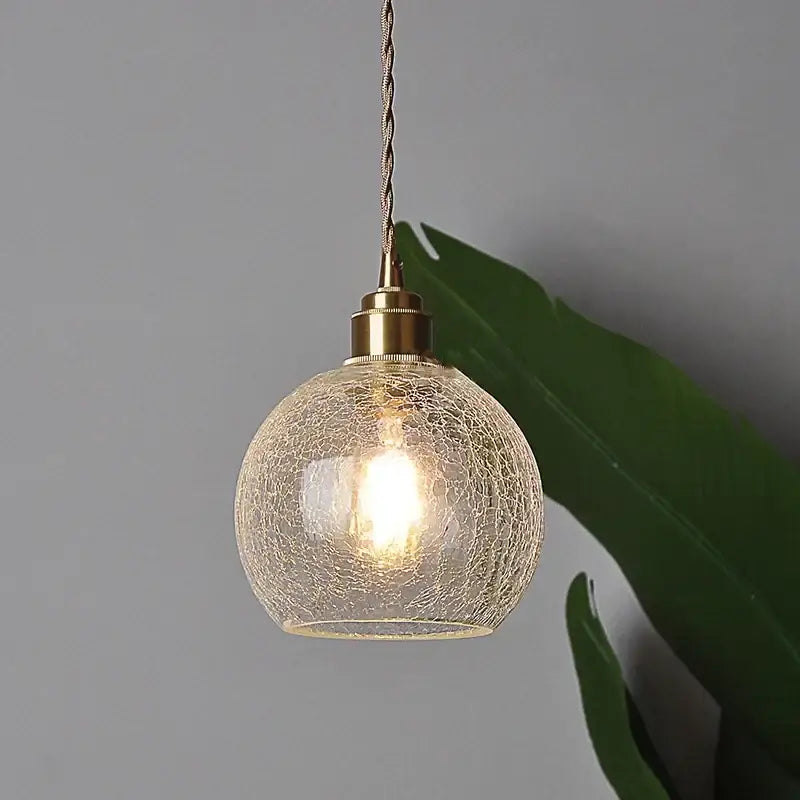 Warm-toned vintage brass crackled glass globe led pendant light with twisted cord for kitchen decorbites decor