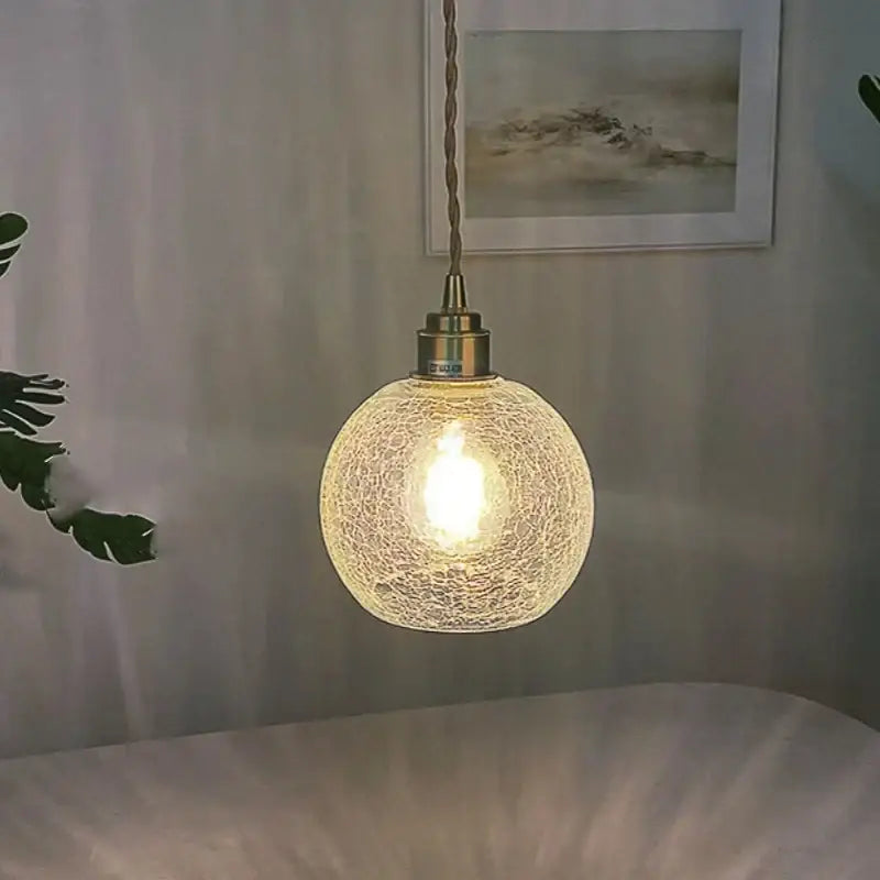 Vintage brass crackled glass globe led pendant light with warm textured glass globe and brass-toned metal fixture
