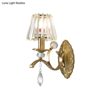 Vintage brass crystal fringe wall sconce with gold-toned finish and faceted crystals for e14 bulb base lighting
