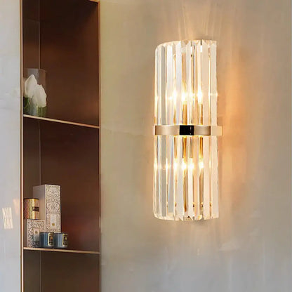 Vintage brass crystal wall lamp with vertical clear glass rods and gold-toned metal accents for living room wall lamp