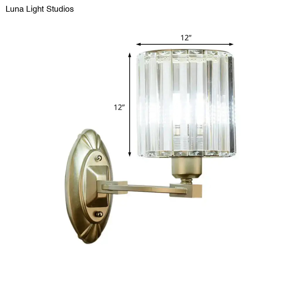 Vintage brass crystal wall light fixture with brushed brass finish and cylindrical prismatic crystal shade for living room