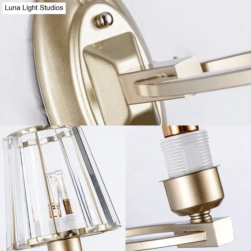 Vintage brass wall light fixture with gold-toned crystal-encased lampshade and brushed metal finish inches tall
