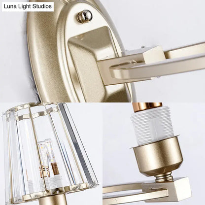 Vintage brass wall light fixture with gold-toned crystal-encased lampshade and brushed metal finish inches tall