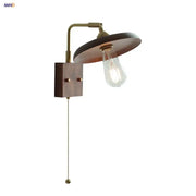 Vintage brass and dark wood wall light sconce with pull chain lamp featuring a vintage edison bulb by decorbites copper