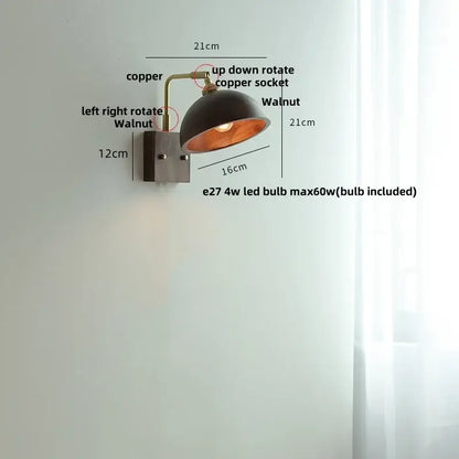 Vintage brass and dark wood wall light sconce with matte black dome shade and decorbites copper arm for adjustable lighting