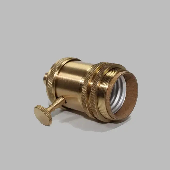 Vintage brass e27 lamp holder with textured metal socket and knurled adjustment knob for living room lighting
