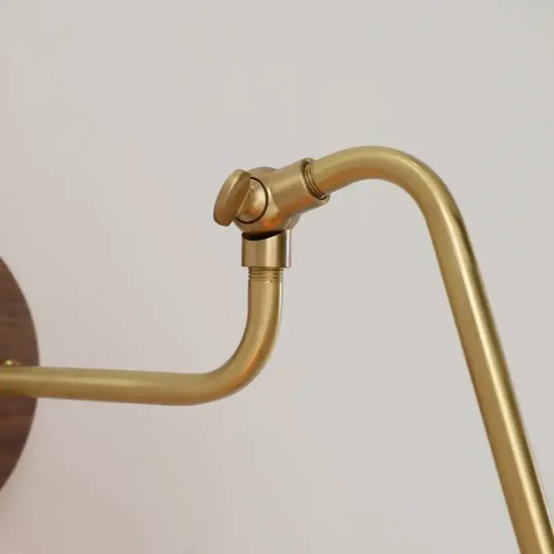 Brass-finished vintage decorbites led wall sconce with curved arm and rotate pull chain for bedroom lighting