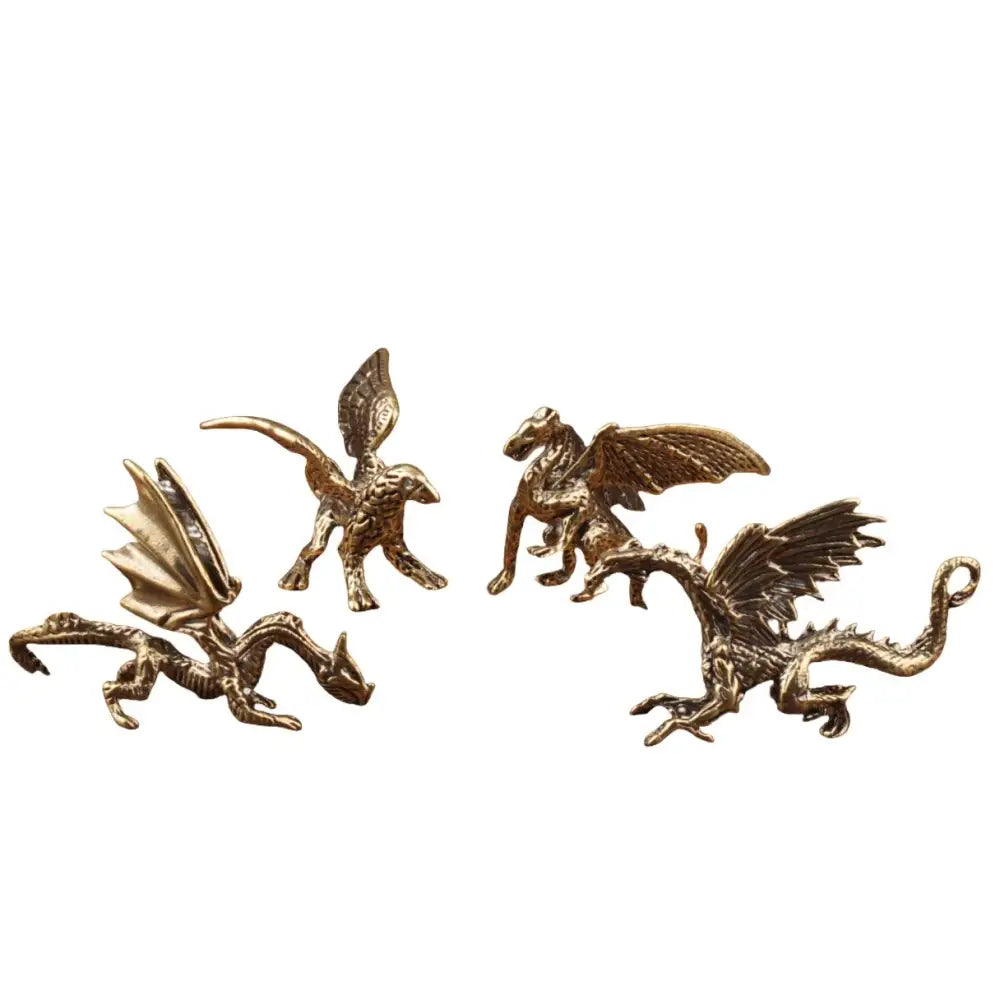 Golden metallic brass flying dragon sculpture with detailed scales and wings vintage decorbites living room ornament