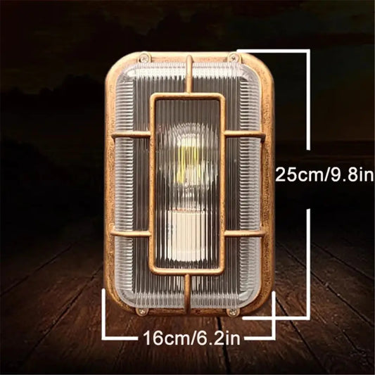 Vintage brass gas station canopy wall light with brass metal frame ribbed glass panels and exposed led bulb for outdoor use