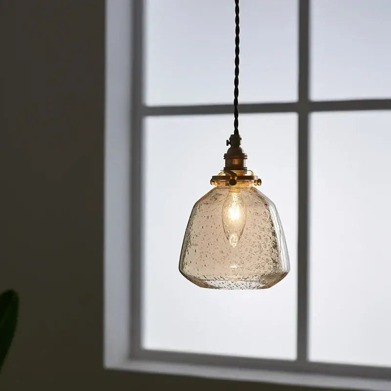 Vintage brass glass led pendant lamp with warm textured shade and twisted black cord for dining room pendant light