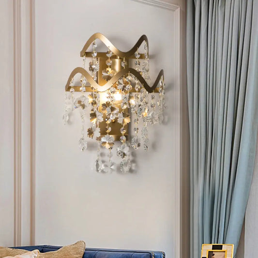 Vintage Brass LED Wall Sconce with Crystal Strand Draping and Waveform Edge