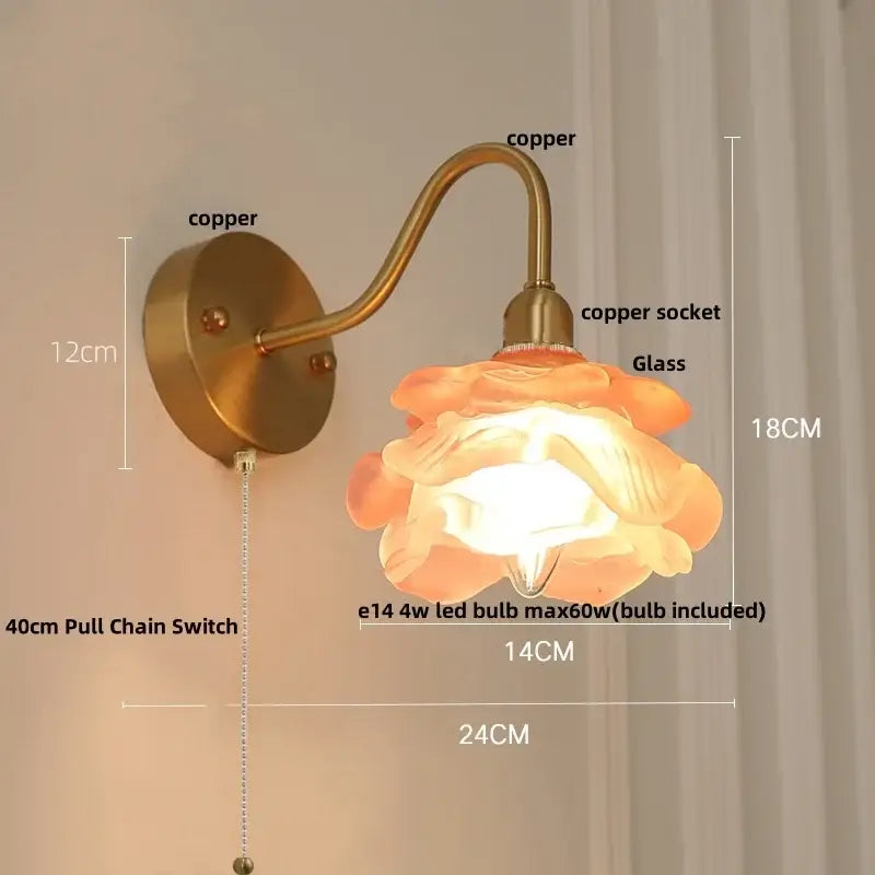 Vintage brass led wall sconce with copper finish and delicate peach glass flower shade for bathroom vanity decorbites brass led wall
