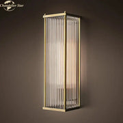 Vintage brass rectangular wall sconce with vertical frosted glass panels for living room decorbites crystal wall light