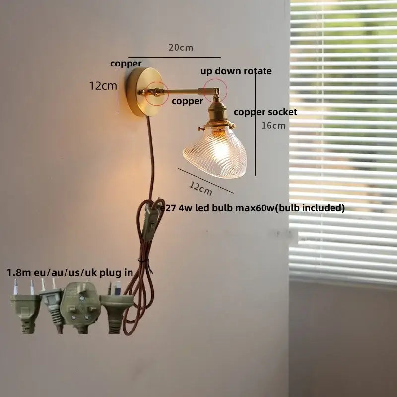 Vintage brass swing arm wall light fixture with copper ribbed glass shade and up-down rotating arm for bedroom use