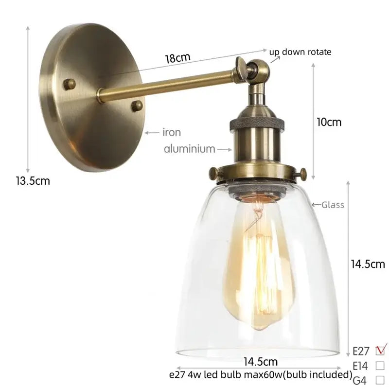 Vintage brass wall light fixture with clear glass dome and exposed edison bulb for bedroom lighting