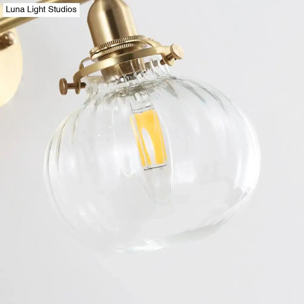 Vintage brass wall light with champagne clear ribbed glass shade and led bulb for bedroom lighting