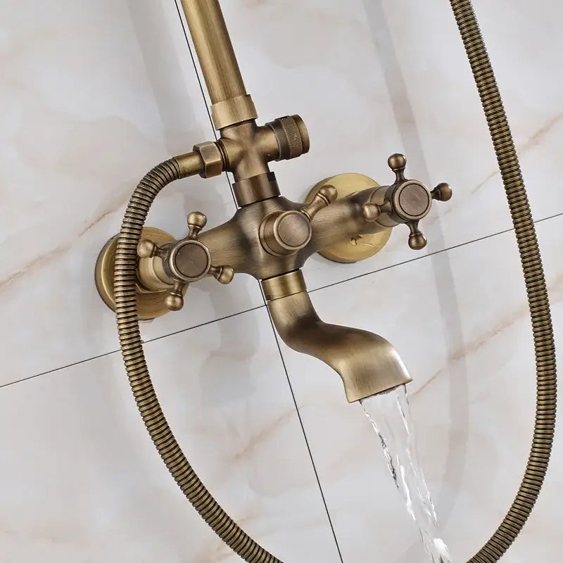 Vintage brass wall mount bathtub faucet with three cross-handle controls and flexible hose for bathroom decorbites brass wall