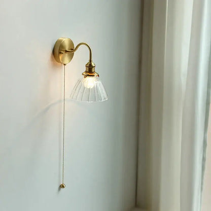 Vintage brass wall sconce with scalloped clear glass and pull chain ideal for stairways decorbites clear glass lighting