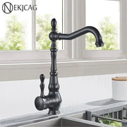 Vintage bronze and black kitchen sink faucet with black matte finish ornate detailing and 360 rotate spout decorbites bronze black kitchen
