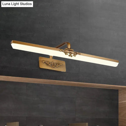 Vintage bronze floral led wall light fixture featuring a gold-toned ornate led mirror light with scrollwork accents