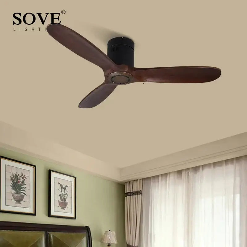 Sove ceiling fan with three brown wood blades and black motor housing featuring remote control for living room use