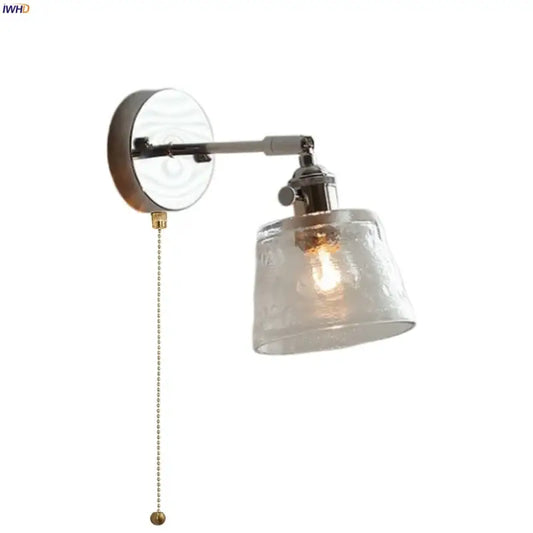 Vintage brushed nickel led wall light with textured frosted glass shade designed for bedroom use as a glass sconce