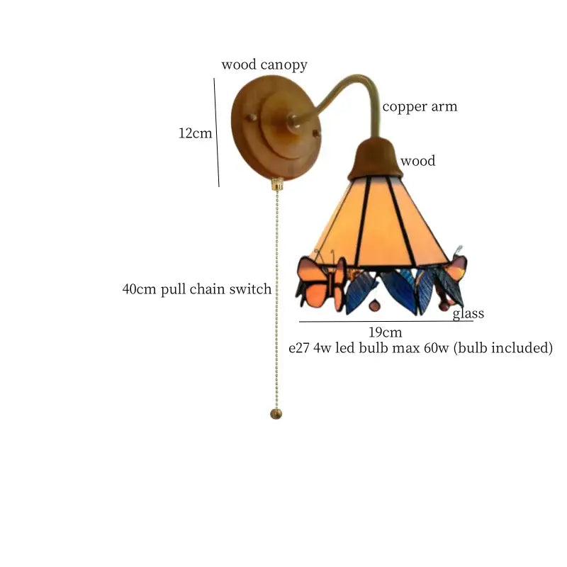 Vintage wall light with copper arm and decorbites butterfly glass shade in amber blue and orange for bedroom decor