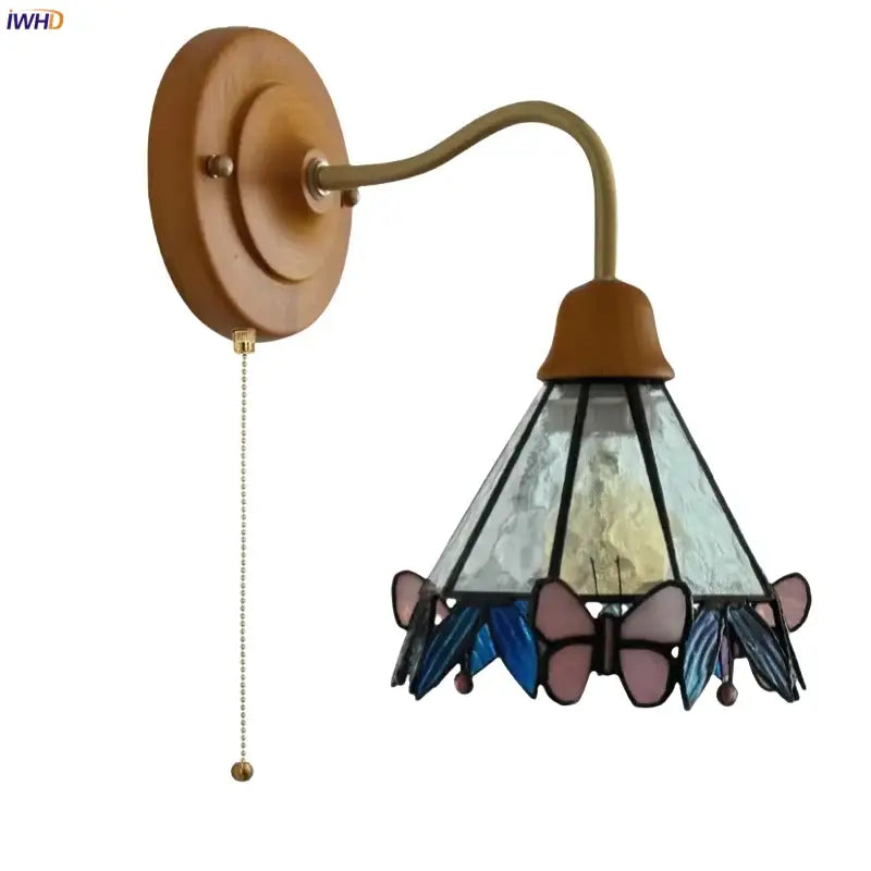 Vintage butterfly glass wall light with copper arm wooden backplate and pink and blue stained glass shade decorbites butterfly glass