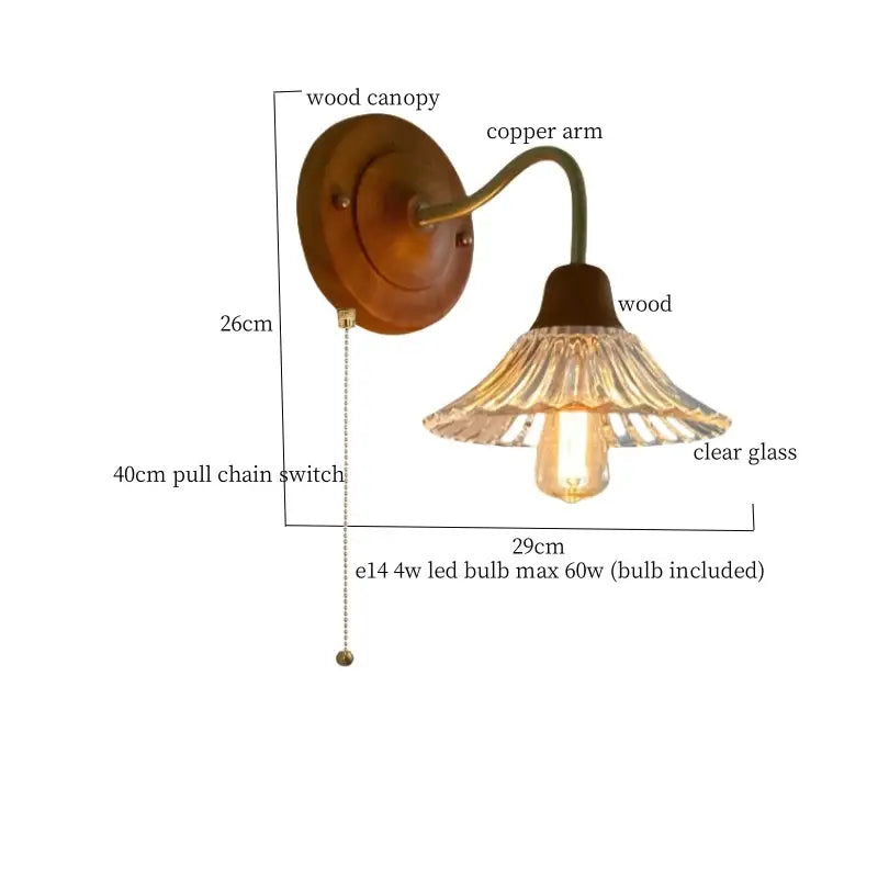 Antique-style wall light with copper arm, warm wood canopy, and clear fluted decorbites butterfly glass shade in pink and blue