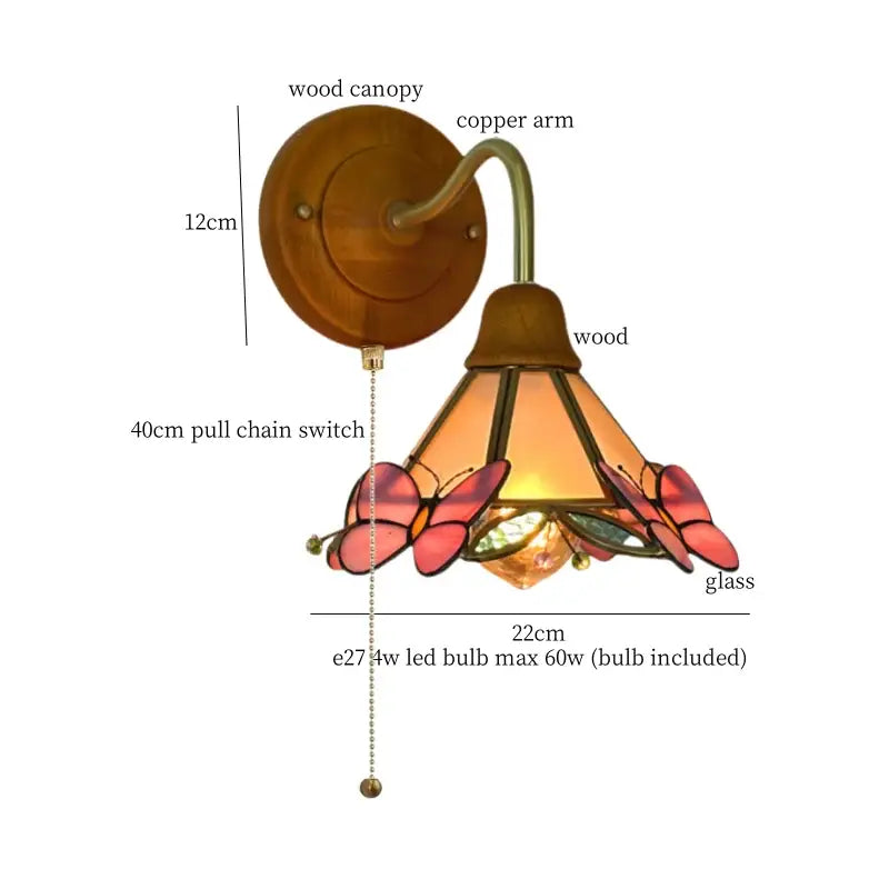 Vintage butterfly glass wall light with copper arm, warm-toned stained glass, and wooden canopy for bedroom decorbites wall light