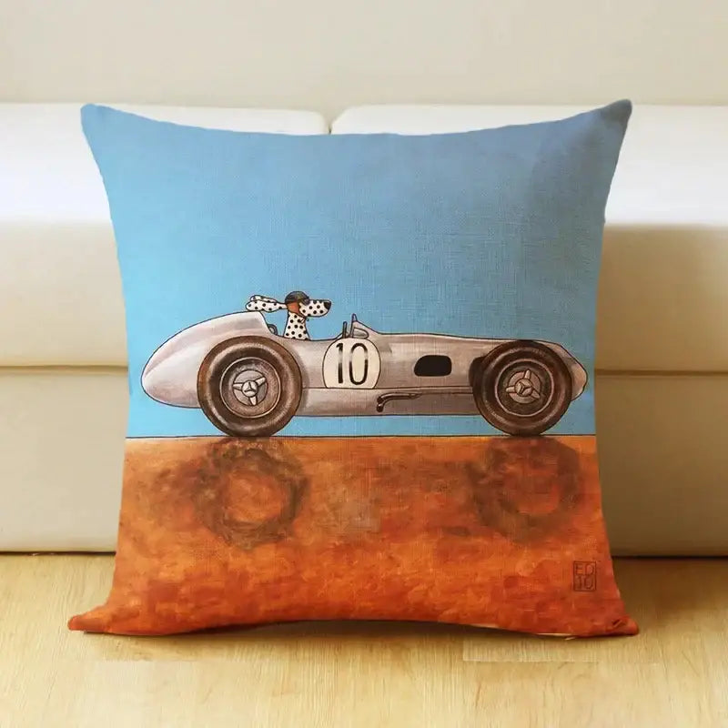 Blue and orange linen pillow cover featuring a decorbites cartoon dog car vintage race car driven by a dalmatian for living room decor