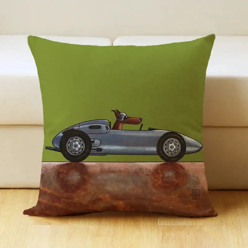 Green linen pillow cover featuring a decorbites cartoon dog car with a silver race car and brown dog on rusted surface