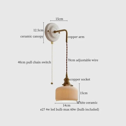 Vintage ceramic and brass wall sconce with adjustable led light, white canopy, copper arm, and ribbed glass shade by decorbites