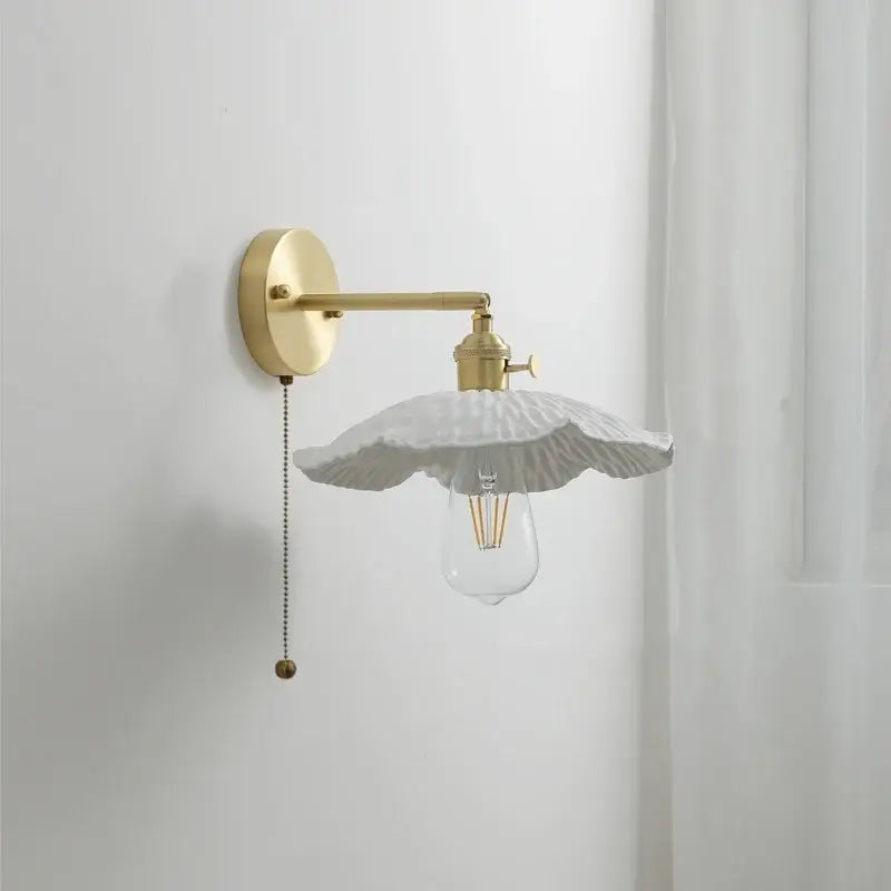 Vintage ceramic copper led wall light with delicate white flower-shaped ceramic shade and brass decorbites ceramic copper mount