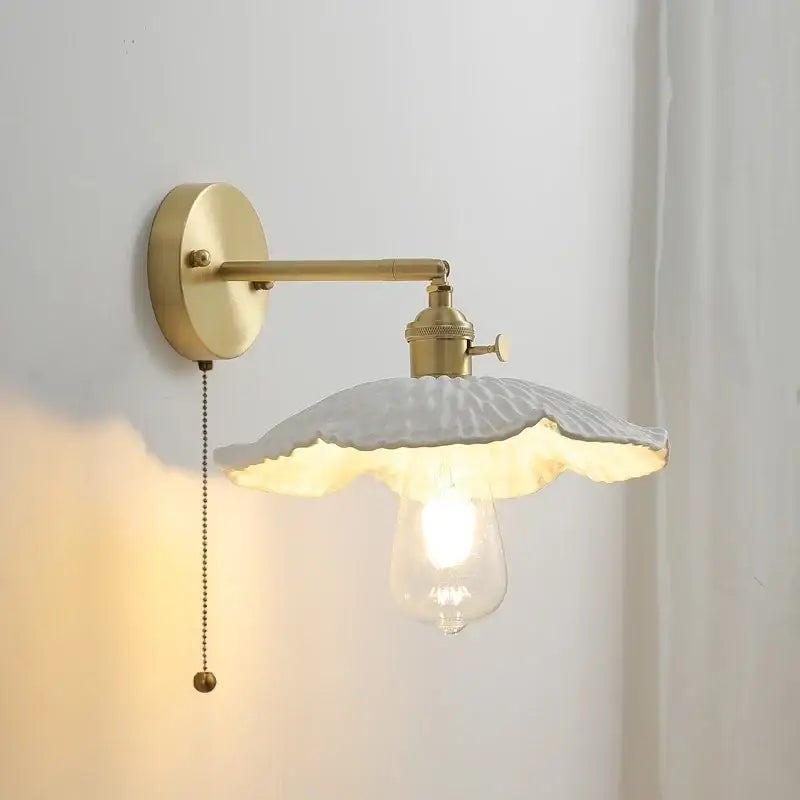 Brass-finished vintage ceramic copper led wall light with off-white ruffled ceramic shade for bedroom decorbites wall light