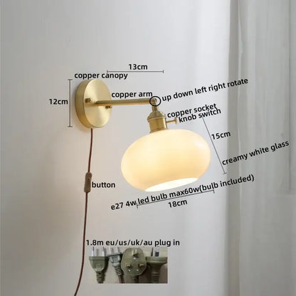 A vintage ceramic copper led wall light with a warm copper finish and creamy white ruffled shade for bedroom decor