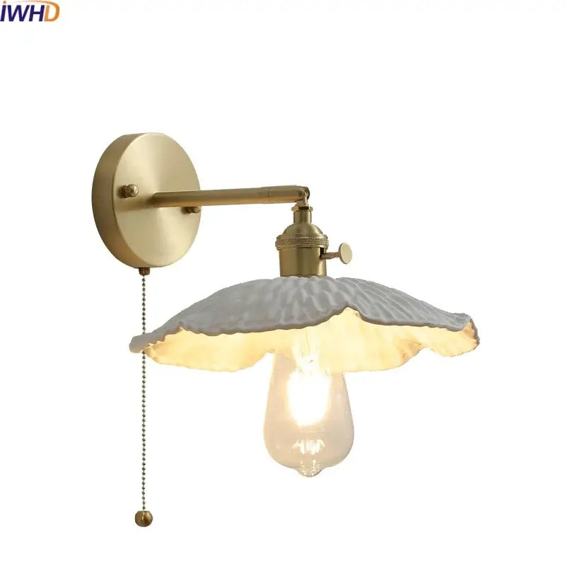 Vintage ceramic copper led wall light with brass-finished metal frame and off-white ruffled glass shade for decorbites bedroom decor
