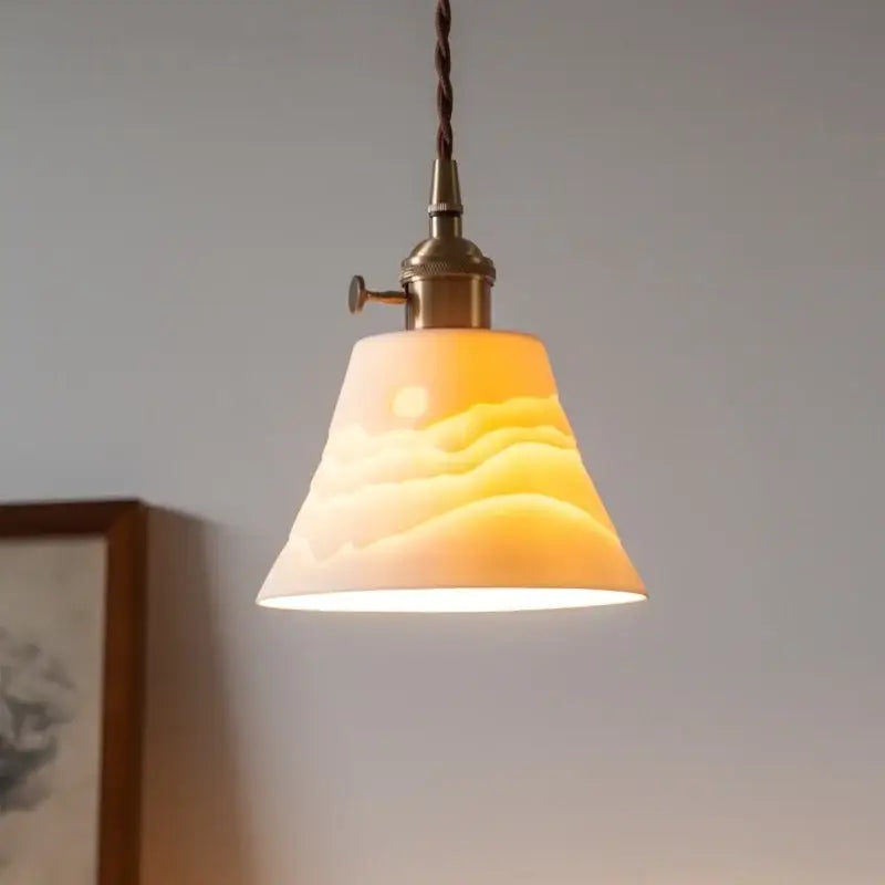 Vintage ceramic led pendant light with warm-toned hand-blown glass and brass finish featuring gradient yellow decorbites ceramic led design