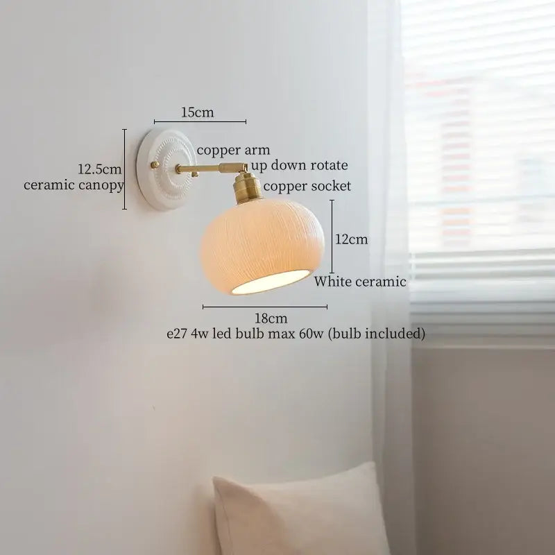 White ceramic led wall lamp with copper arm and socket featuring up-down rotating design for bedroom decorbites ceramic led wall