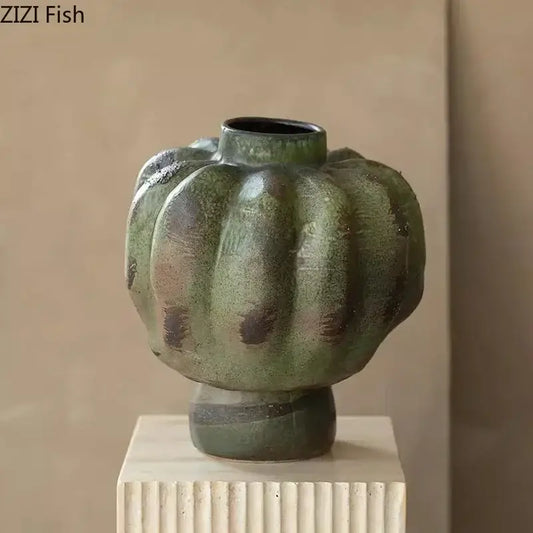A rustic green vintage ceramic vase with pumpkin shape and brown speckles for living room decorbites green vintage decor