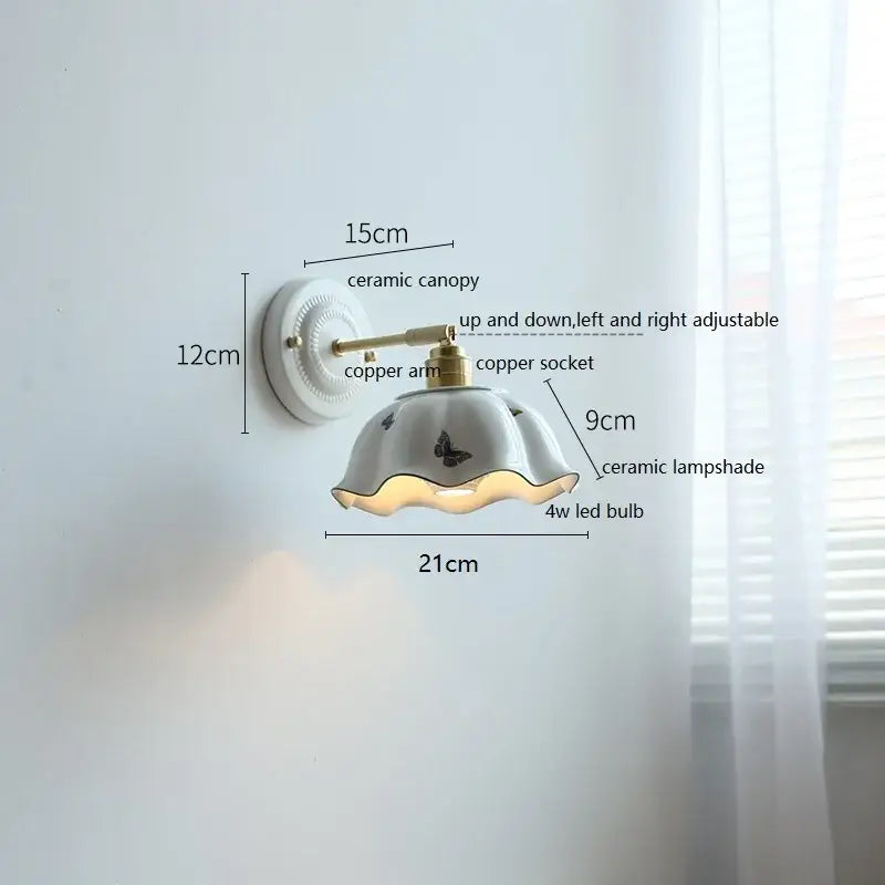 Vintage ceramic wall lamp with delicate white scalloped ceramic shade and brass accents for bedroom decorbites ceramic wall