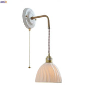 Vintage ceramic wall sconce with white ceramic backplate copper arm and off-white ribbed glass shade for bedroom decorbites ceramic wall