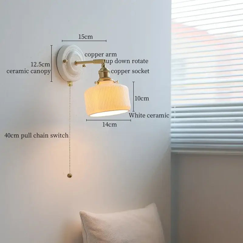 Vintage white ceramic wall sconce with ribbed shade and copper arm decorbites ceramic wall sconce for bedroom use